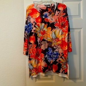 Light weight, longer in the back, artistic, sweater. Worn once